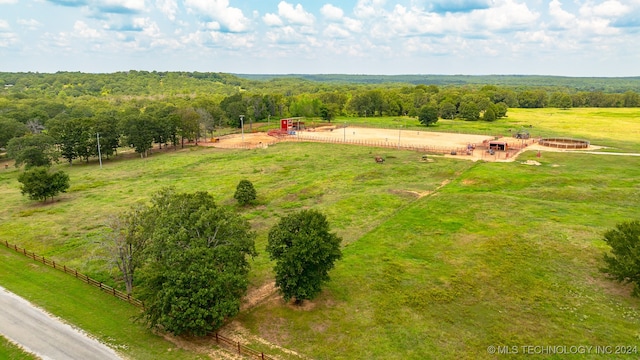 birds eye view of property featuring a rural view