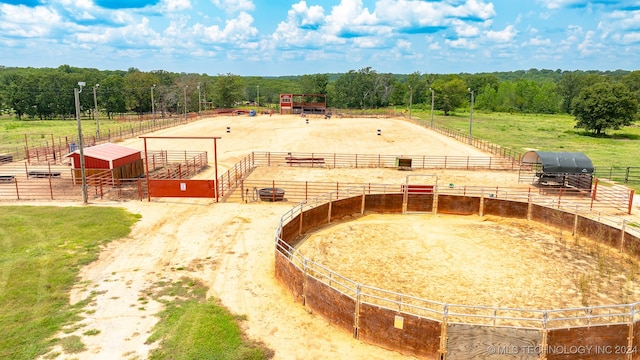 birds eye view of property featuring a rural view