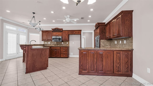 kitchen with ceiling fan, light stone countertops, crown molding, and appliances with stainless steel finishes