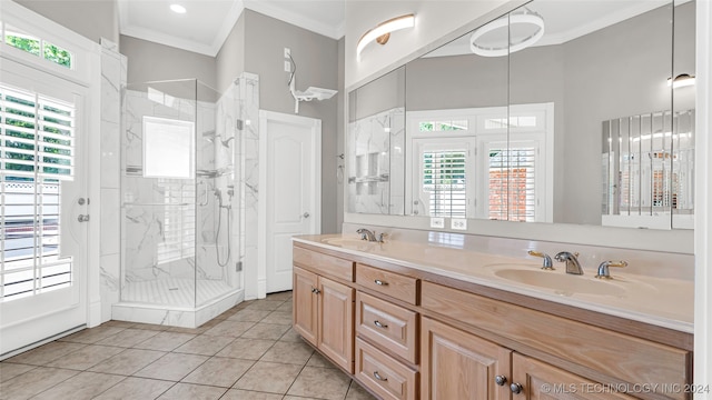 bathroom featuring tile patterned floors, vanity, an enclosed shower, and ornamental molding