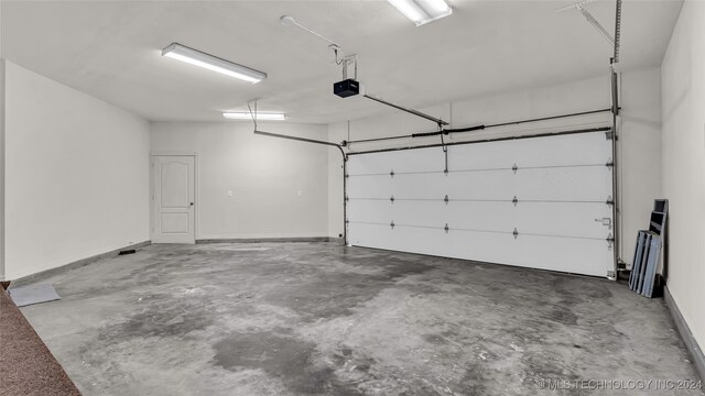 garage with a garage door opener