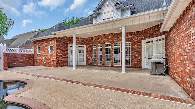 rear view of property with a patio area