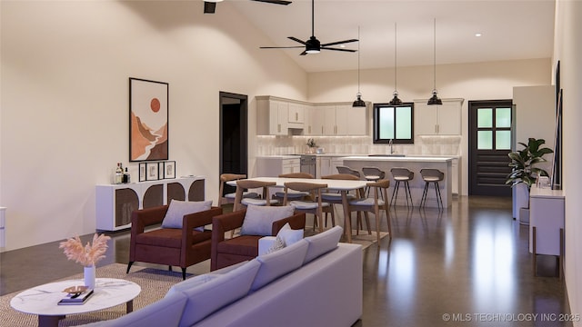 living room featuring ceiling fan, sink, and a high ceiling