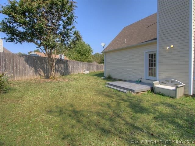 view of yard with a deck