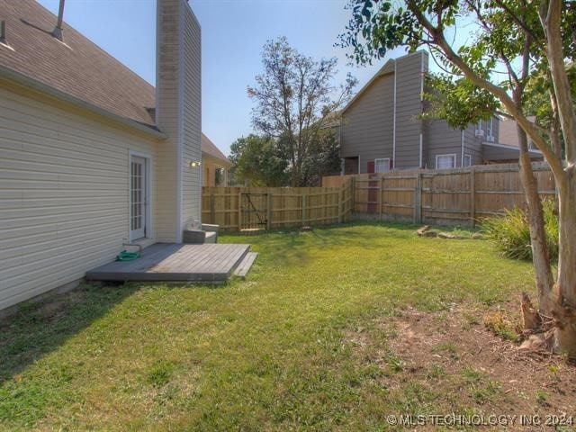 view of yard featuring a deck