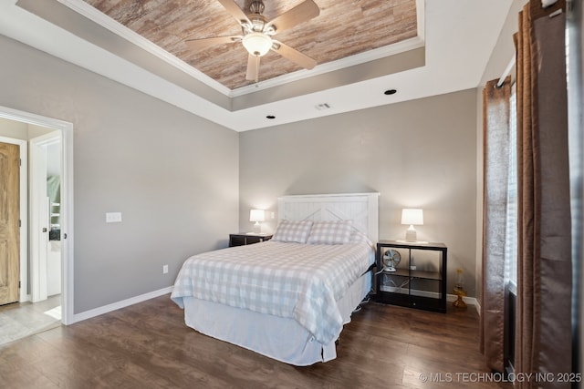 bedroom featuring crown molding, dark hardwood / wood-style floors, wood ceiling, and a tray ceiling