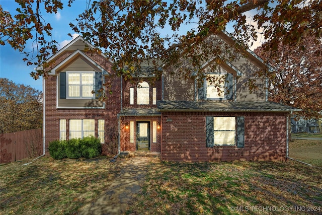 view of front property with a front lawn