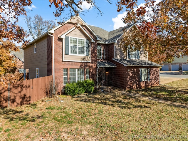 view of front property featuring a front yard