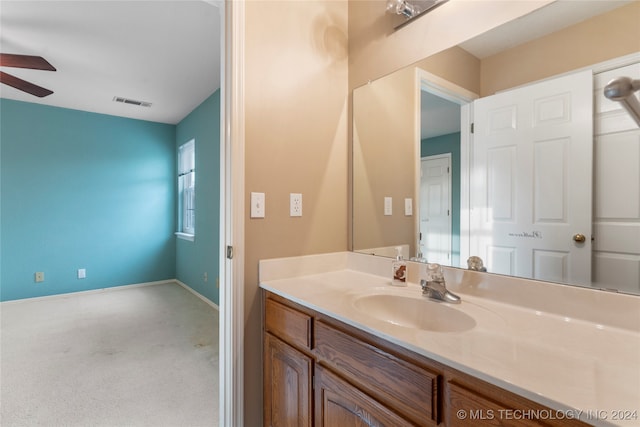 bathroom with vanity and ceiling fan