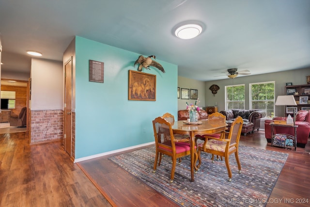 dining area featuring dark hardwood / wood-style floors and ceiling fan