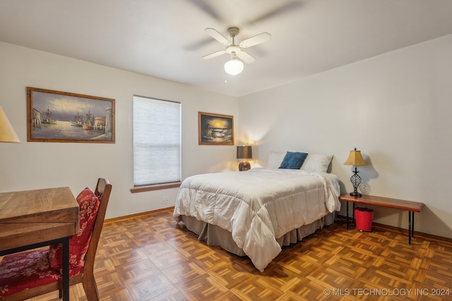 bedroom featuring dark parquet floors and ceiling fan