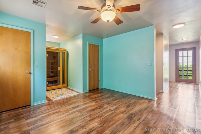 unfurnished bedroom with hardwood / wood-style flooring and ceiling fan