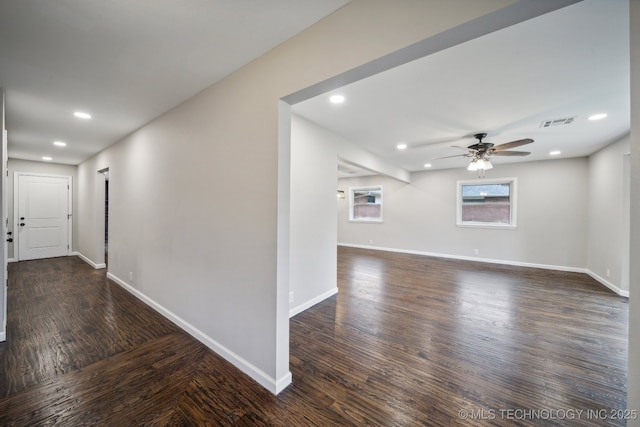 interior space featuring dark hardwood / wood-style flooring and ceiling fan