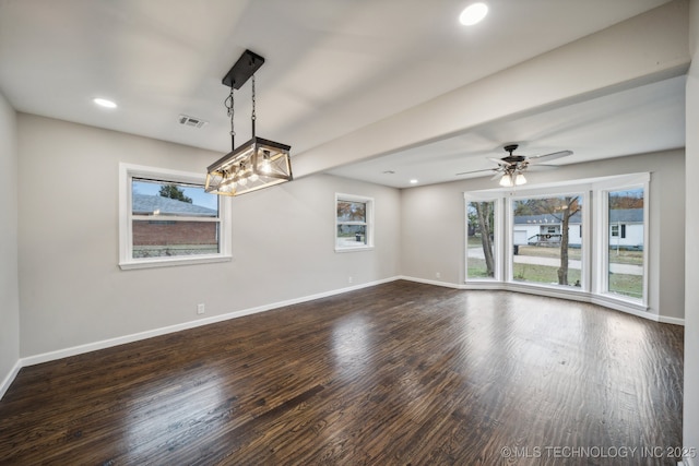 unfurnished room featuring ceiling fan and dark hardwood / wood-style flooring