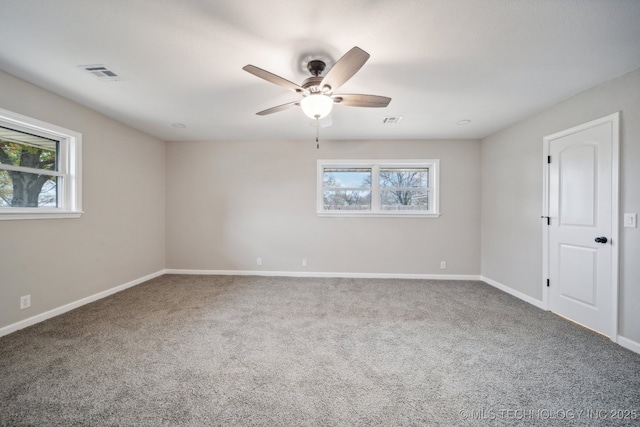 empty room with carpet and ceiling fan