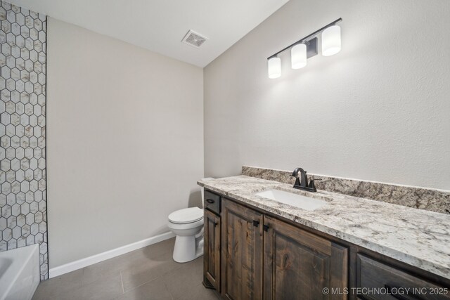 full bathroom featuring vanity, tile patterned flooring, toilet, and separate shower and tub