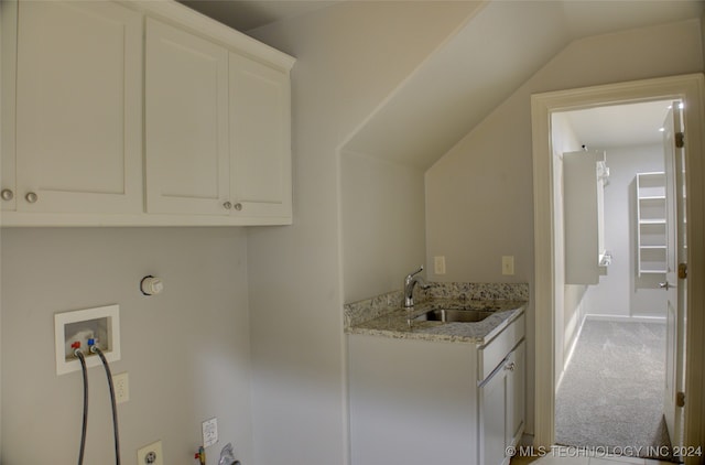 laundry room with carpet, gas dryer hookup, cabinets, sink, and washer hookup