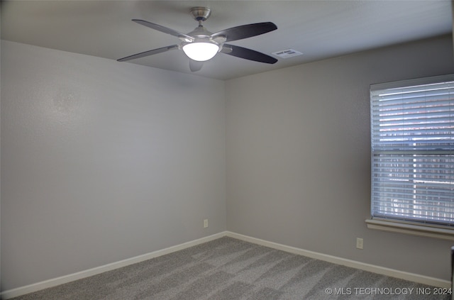 unfurnished room featuring carpet flooring and ceiling fan