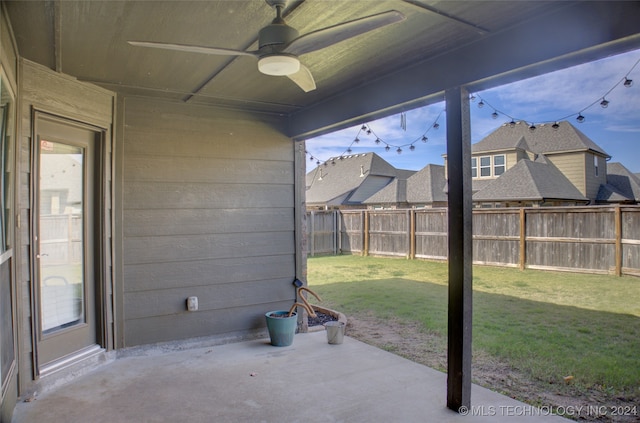 view of patio / terrace featuring ceiling fan