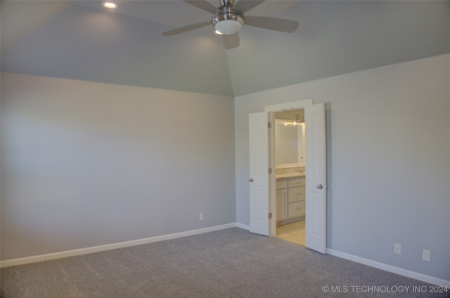 unfurnished bedroom with light carpet, ceiling fan, and lofted ceiling