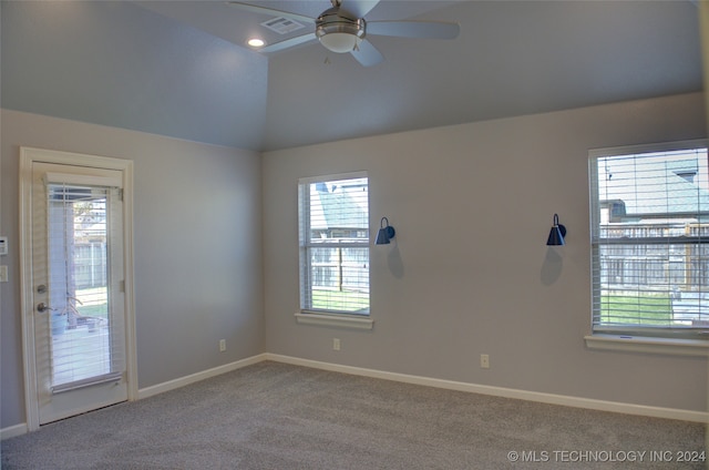 unfurnished room with light carpet, high vaulted ceiling, and ceiling fan