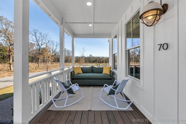 deck featuring covered porch