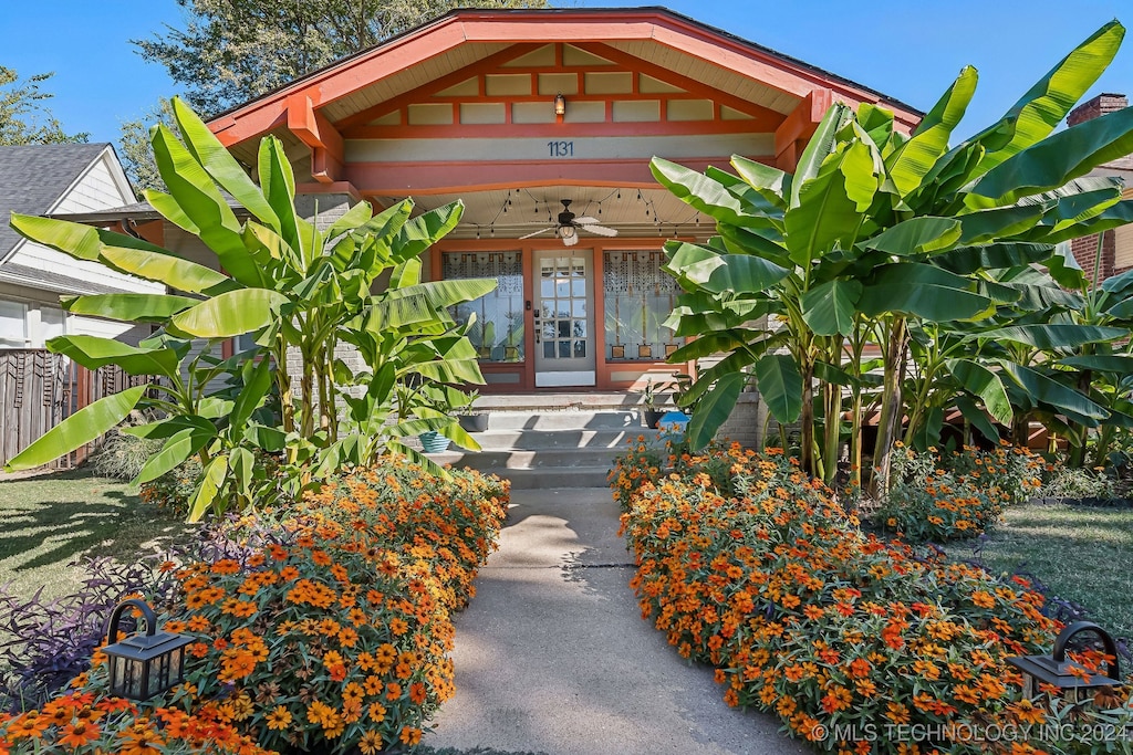 doorway to property with french doors and ceiling fan