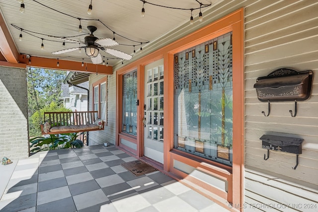 view of patio / terrace with ceiling fan and french doors