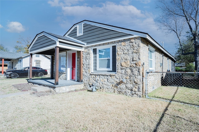 bungalow with a front yard