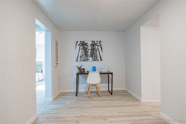 office space with light hardwood / wood-style floors