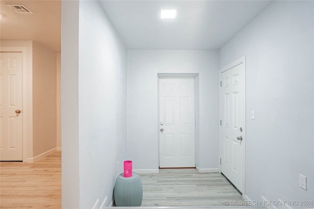 hall featuring light hardwood / wood-style floors