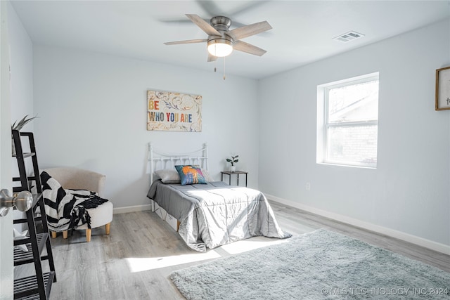 bedroom featuring ceiling fan and light wood-type flooring