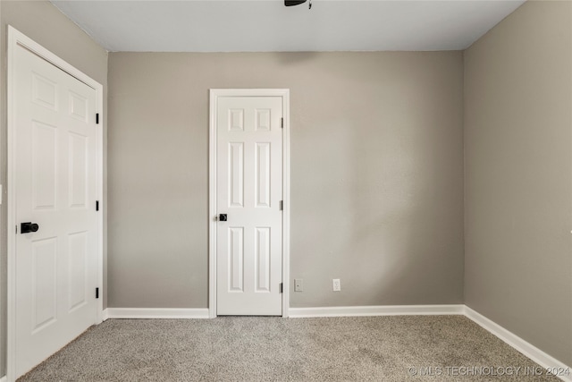 unfurnished bedroom featuring carpet floors