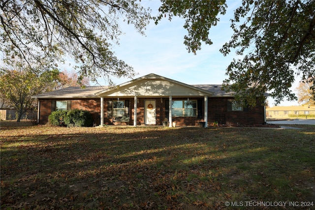 ranch-style house with a front yard