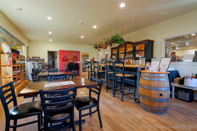 dining space with light wood-type flooring