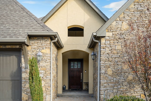 property entrance with a garage