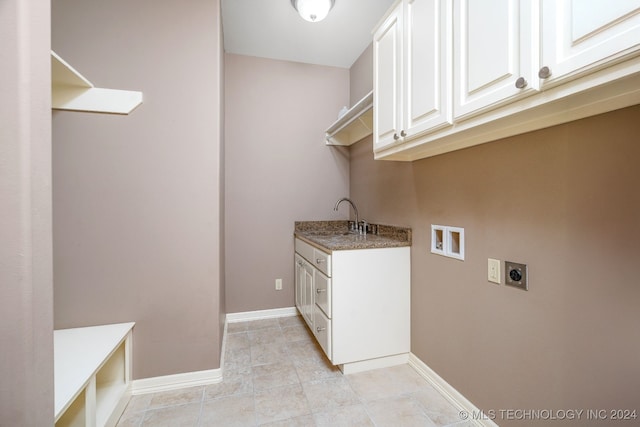 laundry room with sink, washer hookup, cabinets, hookup for an electric dryer, and light tile patterned floors