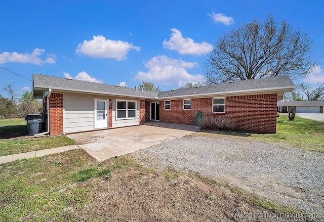 rear view of house featuring a patio area