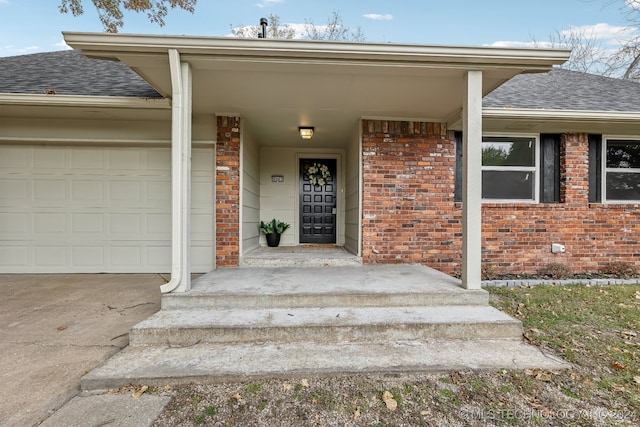 property entrance with a garage