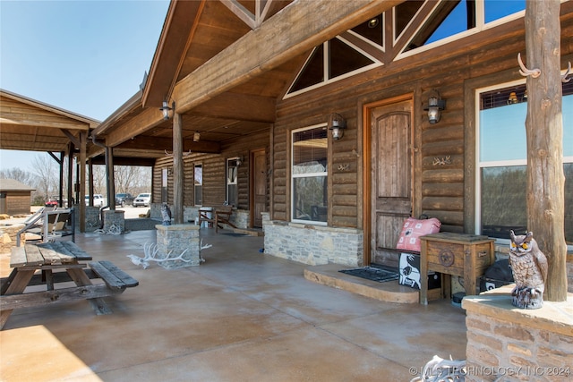 view of patio featuring a porch