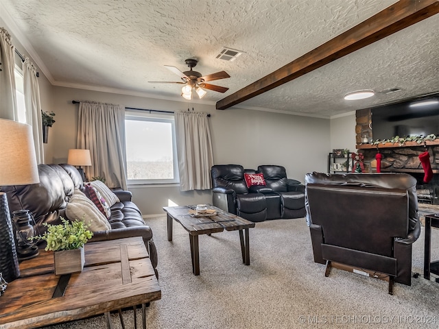 carpeted living room with ceiling fan, beamed ceiling, a textured ceiling, and ornamental molding