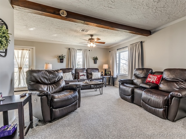 living room featuring carpet flooring, ornamental molding, a textured ceiling, and beamed ceiling