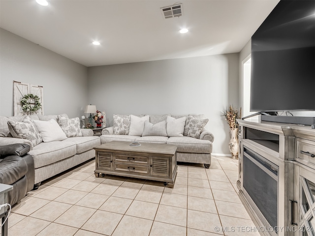 living room featuring light tile patterned floors