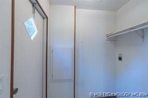 laundry area with electric dryer hookup