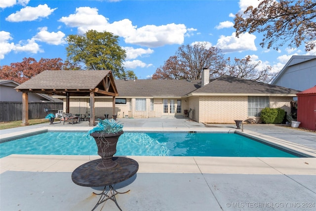 view of swimming pool featuring a gazebo and a patio area