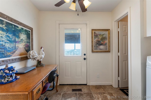 foyer featuring ceiling fan