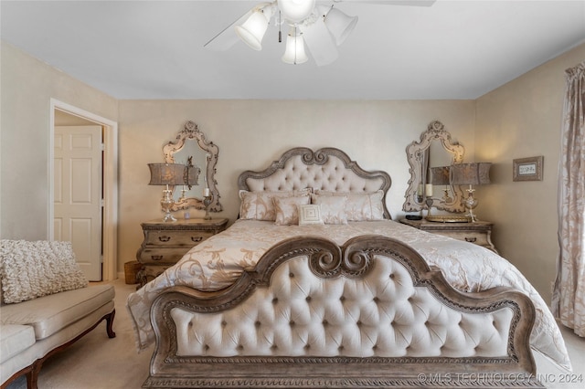 bedroom with ceiling fan and carpet flooring