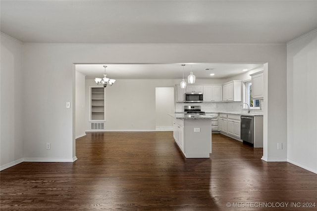 kitchen with white cabinetry, a center island, stainless steel appliances, dark hardwood / wood-style flooring, and pendant lighting