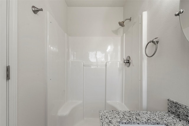 bathroom with a shower