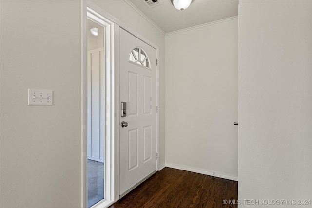 entryway featuring crown molding and dark hardwood / wood-style flooring